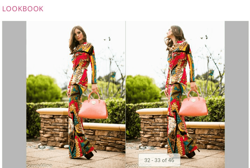 Peach top-handle handbag held by model, compact structured shape with gold hardware.