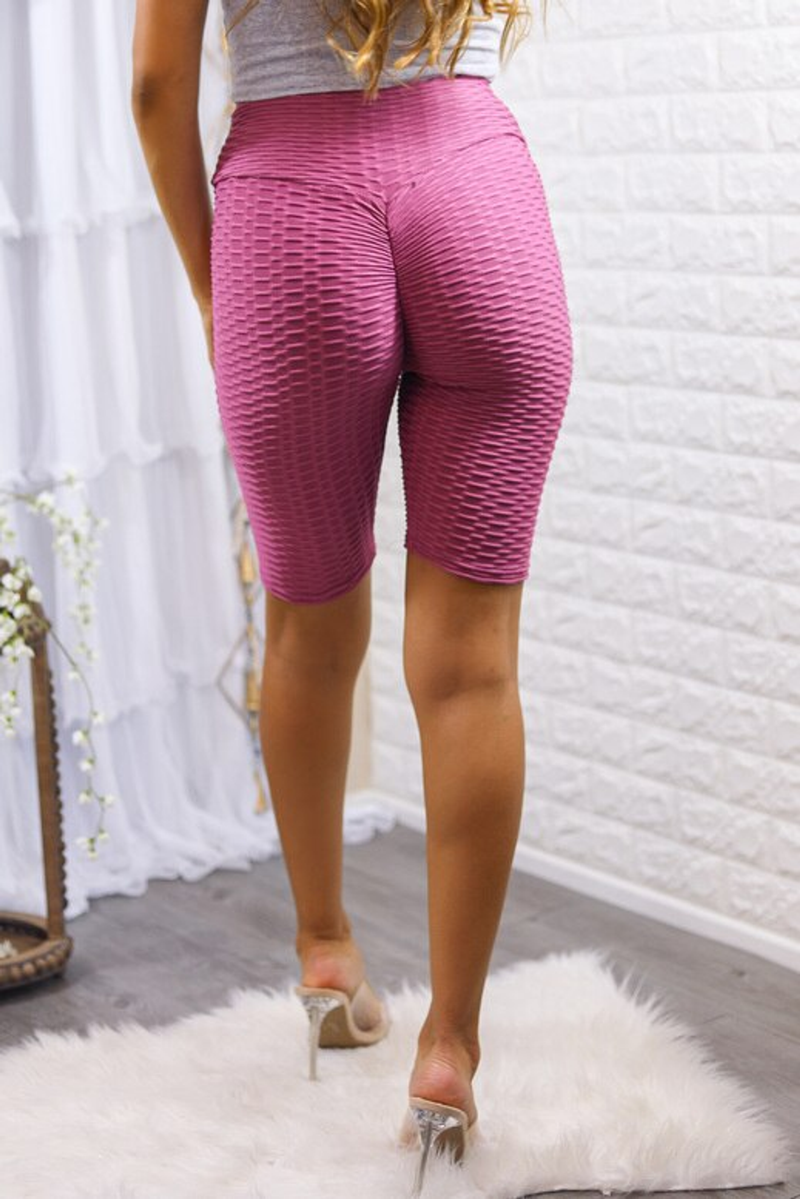 Mauve honeycomb-texture scrunch-butt biker shorts, knee-length, high-rise waistband