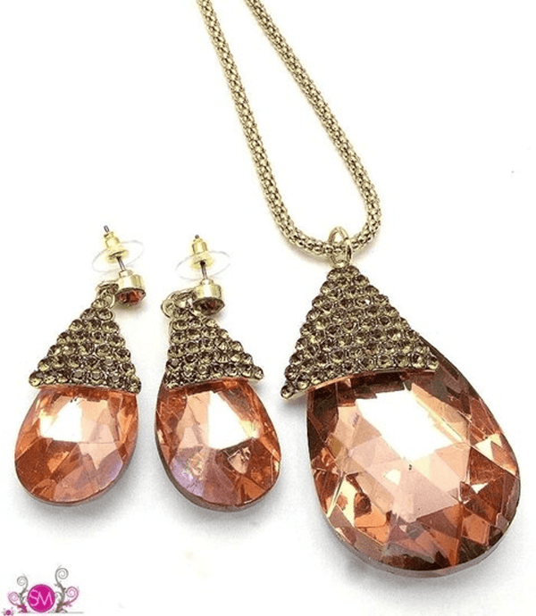 Gold-tone chain with tear-drop crystal pendant and triangular faceted crystal top, orange