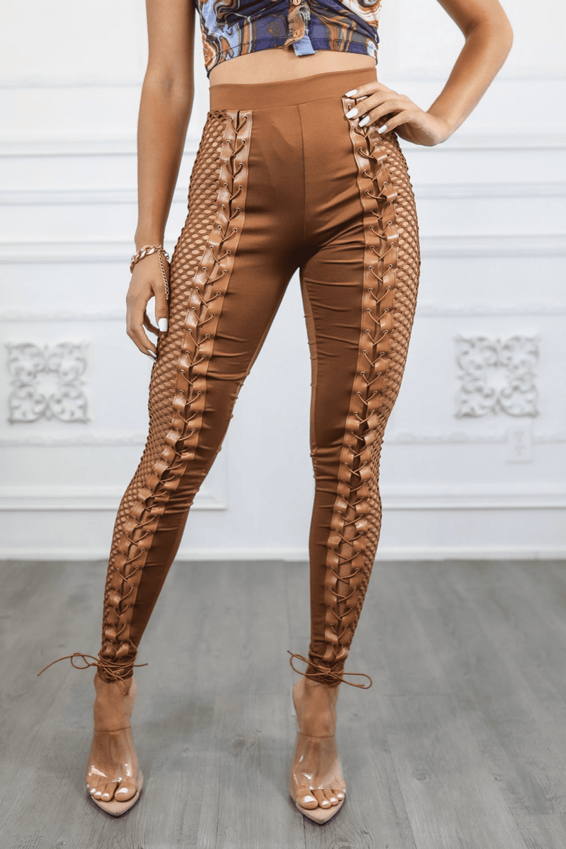 Brown lace-up skinny pants with fishnet side panels and drawstring ankle ties