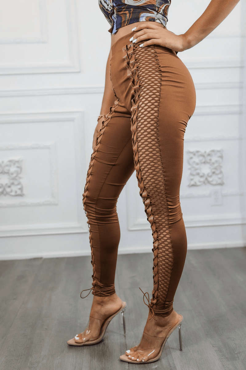 Brown fitted pants with side fishnet lace-up detail and ruched leg seams