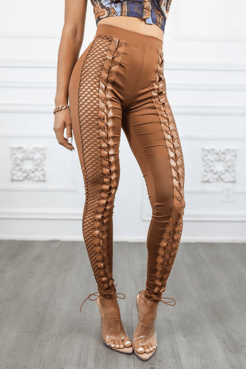 Brown skinny pants with side fishnet trim, lace-up accents, and ankle drawstring ties