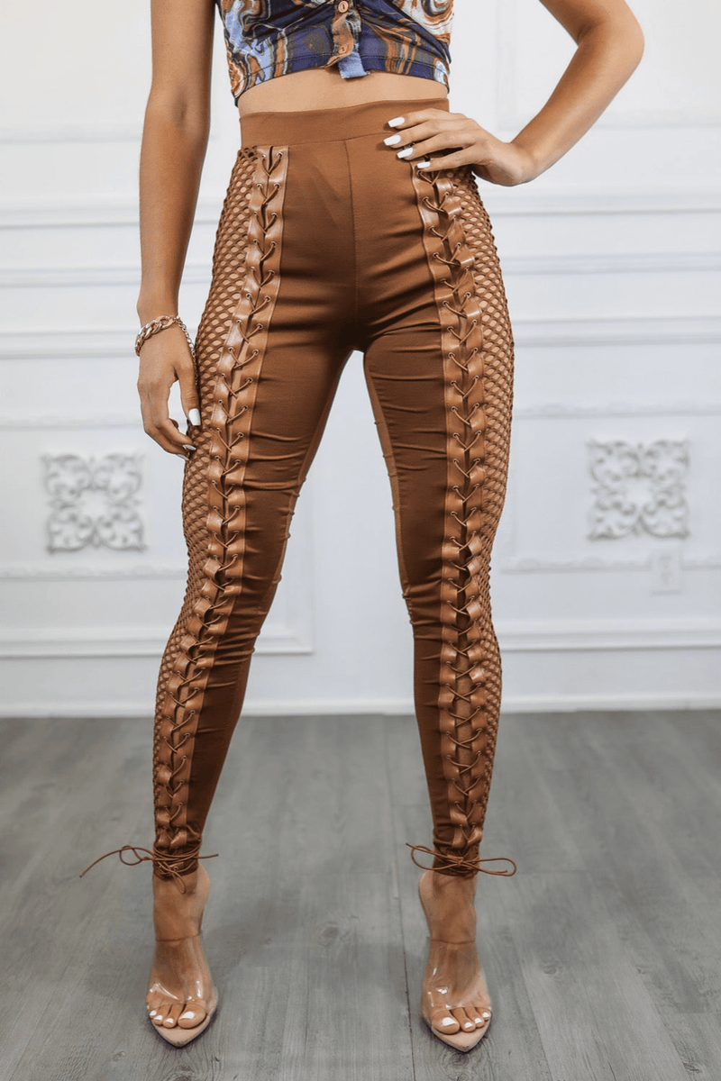 Brown fitted pants with side fishnet lace-up panels and ruched knee-to-ankle detail
