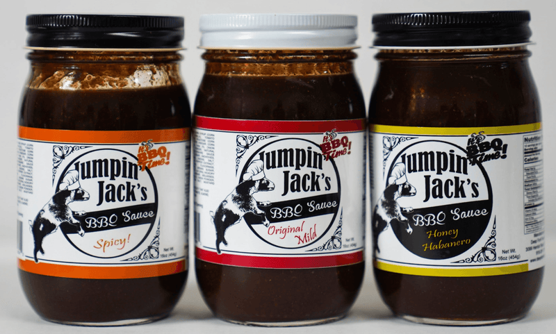 Three Jumpin' Jack's BBQ sauce jars: spicy, original, and honey habanero