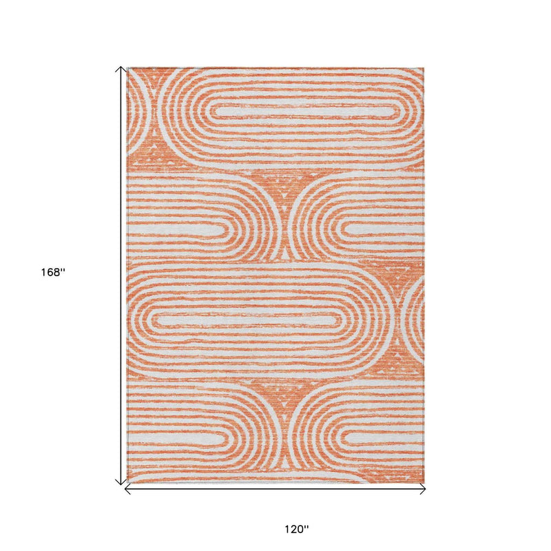 10' X 14' Orange and Ivory Abstract Washable Non Skid Indoor Outdoor Area Rug