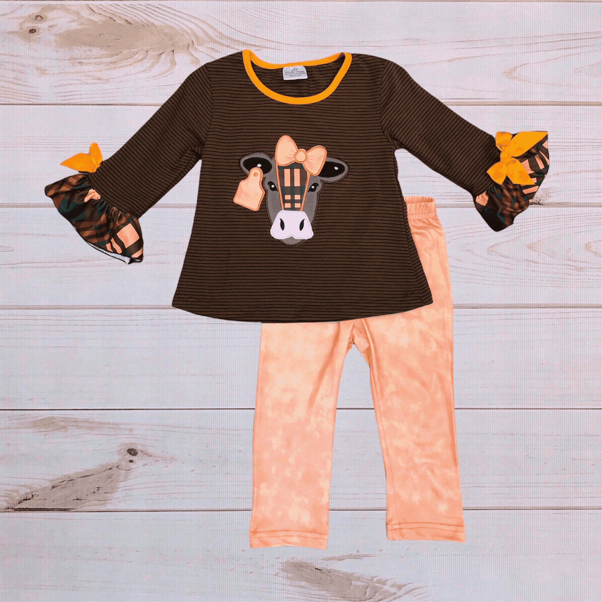 Kids two-piece outfit: dark striped long-sleeve tunic with animal applique and peach pants