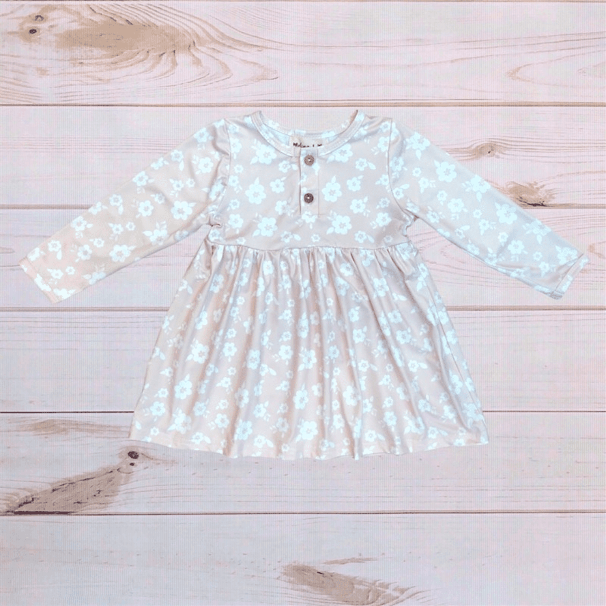 Light blue floral dress with long sleeves and button front