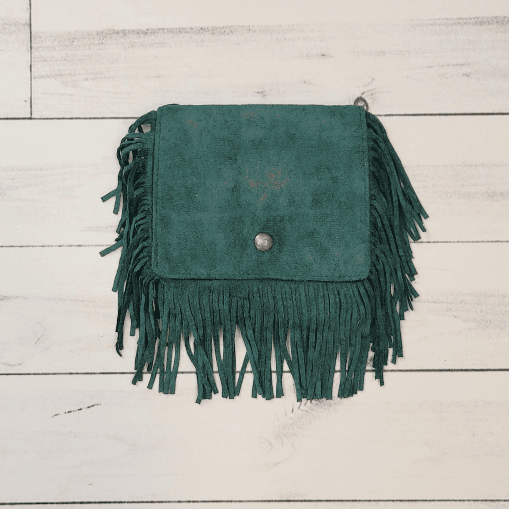 Emerald suede fringe purse with flap and brass-tone snap