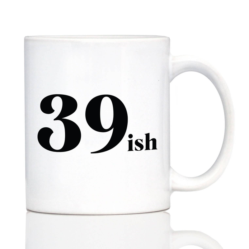 White ceramic coffee mug with black '39 ish' text and right-side handle, isolated
