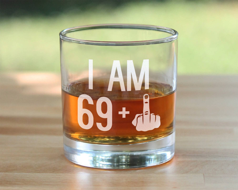 I AM 69+ middle finger whiskey rocks glass with amber drink, etched front design.