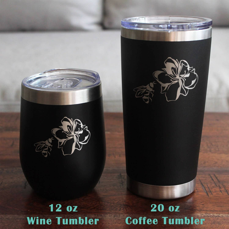 Black insulated tumbler with etched flower and bee design, stainless steel rim