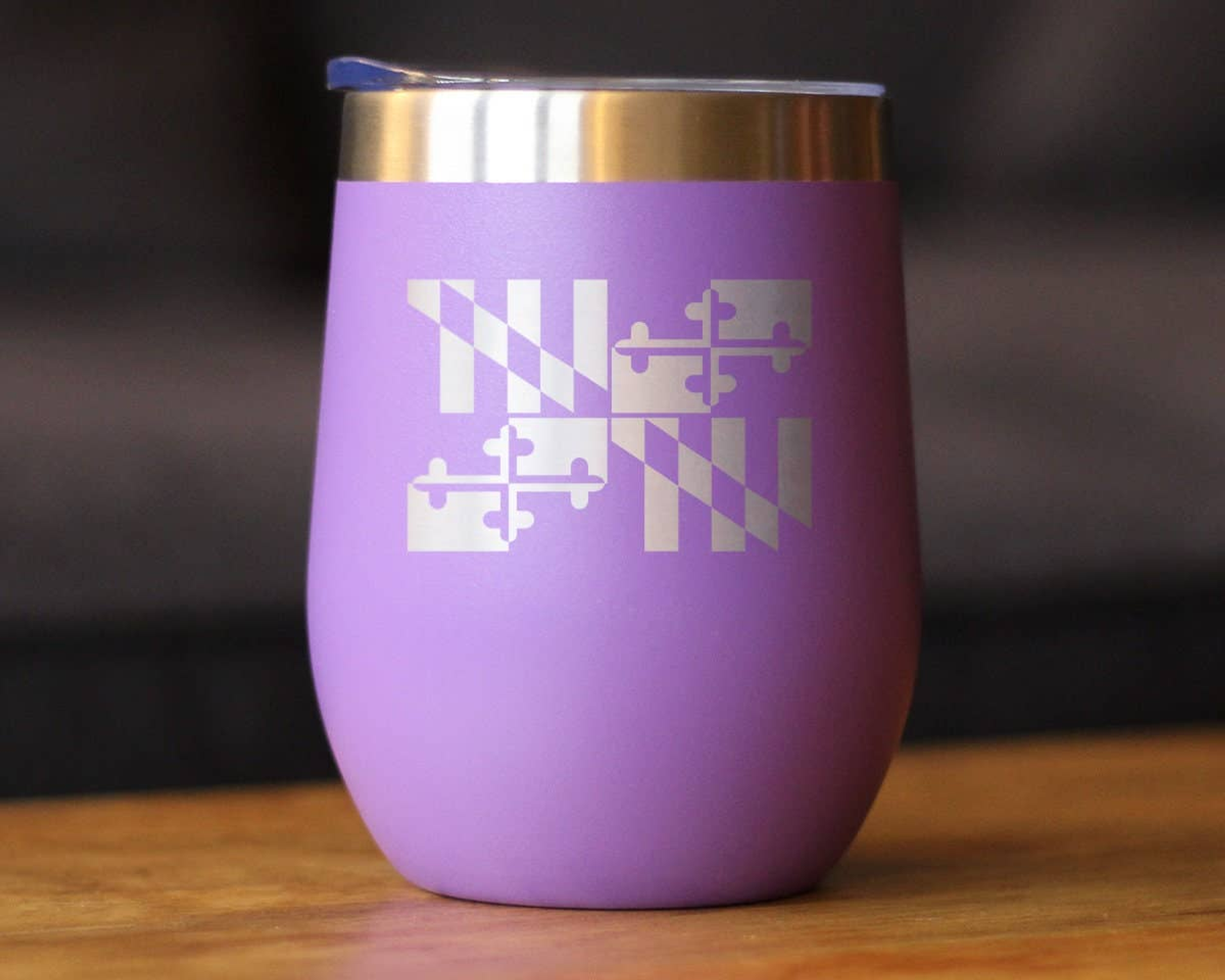 Purple insulated wine tumbler with etched Maryland emblem and stainless steel lid