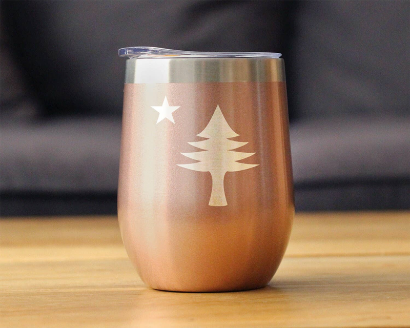 Rose-gold insulated wine tumbler with pine tree and star decal, stainless lid
