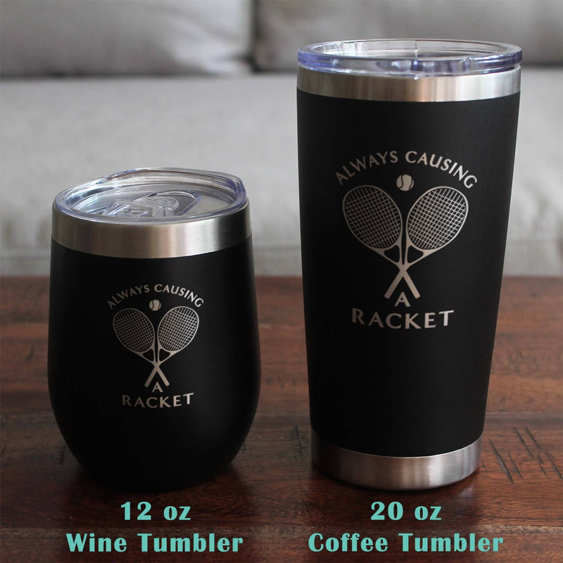 Two black insulated tumblers with clear lids and tennis racket logos on a wooden table