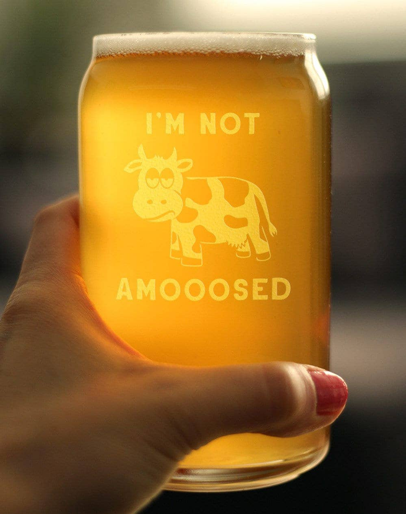Hand-holding beer can pint glass with etched cow and “I’M NOT AMOOOSED”
