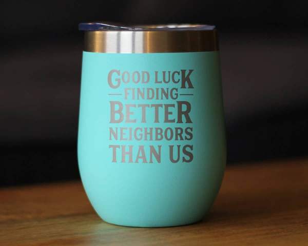 Mint green insulated wine tumbler with gold rim and “Good Luck Finding Better Neighbors” text