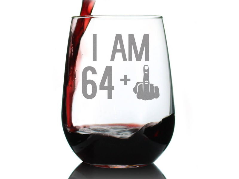 Stemless wine glass with etched "I AM 64" and middle finger graphic, red wine splash