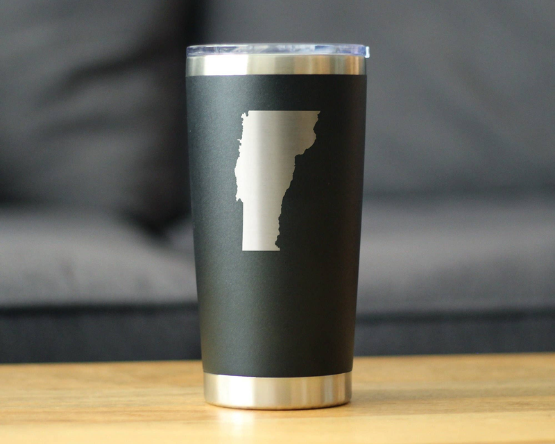 Forest green insulated travel tumbler with Vermont outline graphic on front