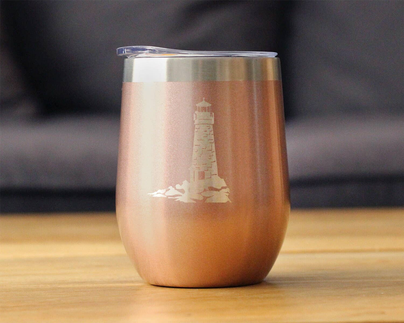 Rose gold insulated wine tumbler with lighthouse decal and stainless steel lid