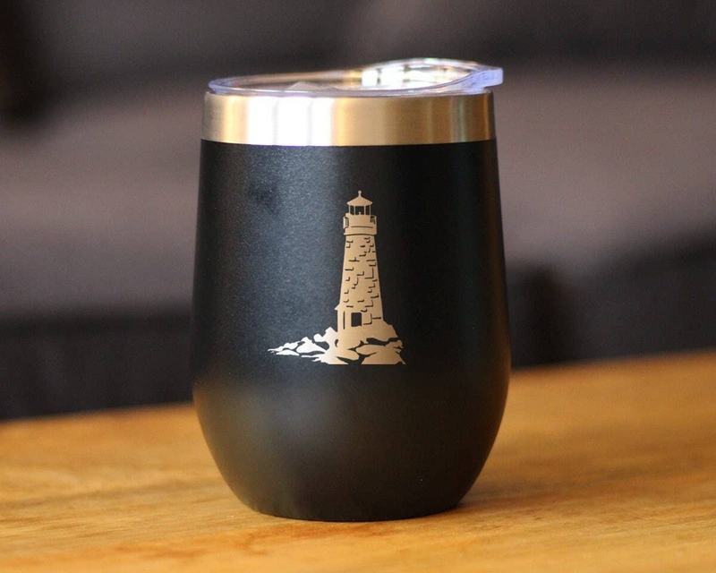 Black insulated wine tumbler with lighthouse graphic, angled view, stainless steel lid