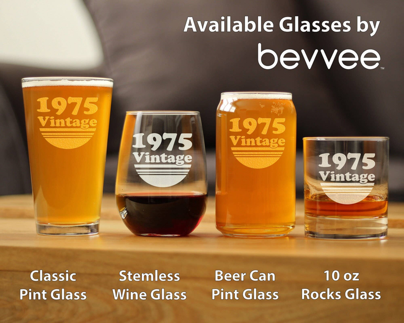 Set of stemless and pint glasses featuring 1975 Vintage etched designs