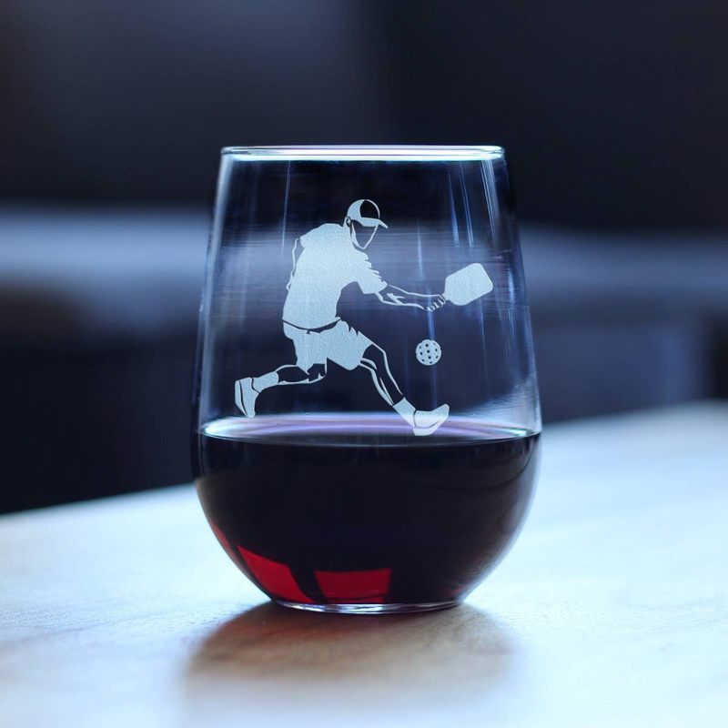 Stemless wine glass standing with etched pickleball player design