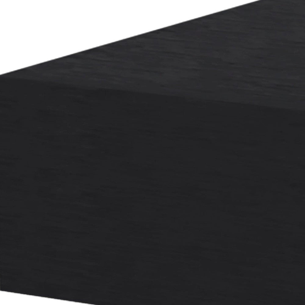 Black wood floating nightstand top with fine-grain texture