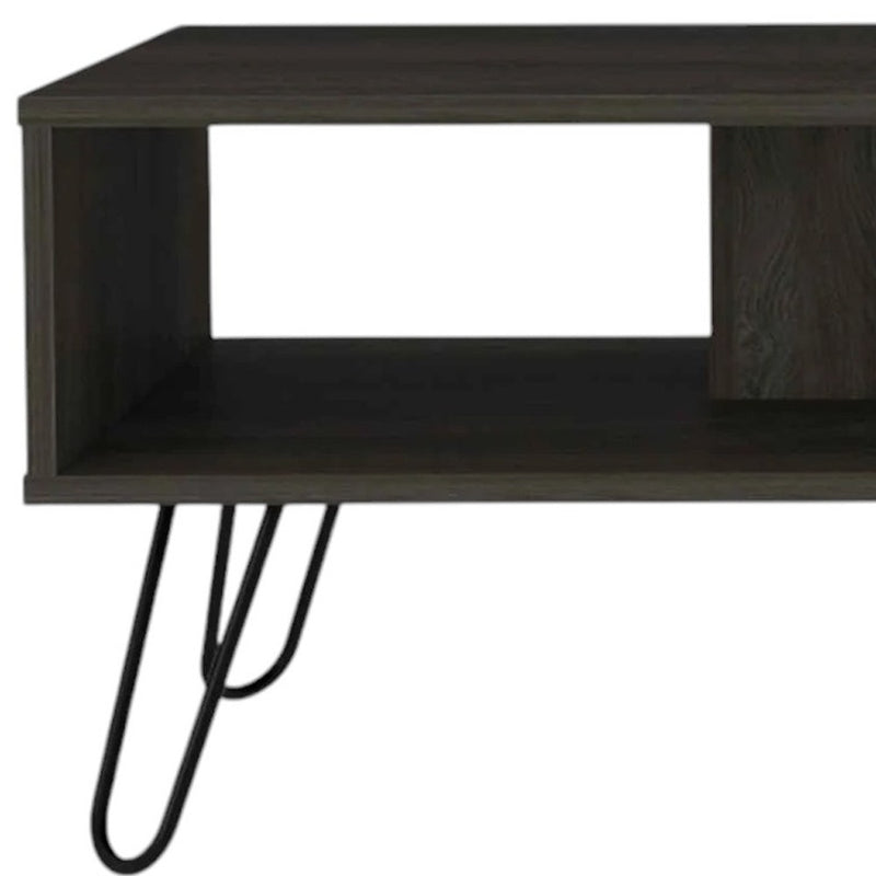 Espresso wood coffee table, open shelf and black metal hairpin legs, angled view