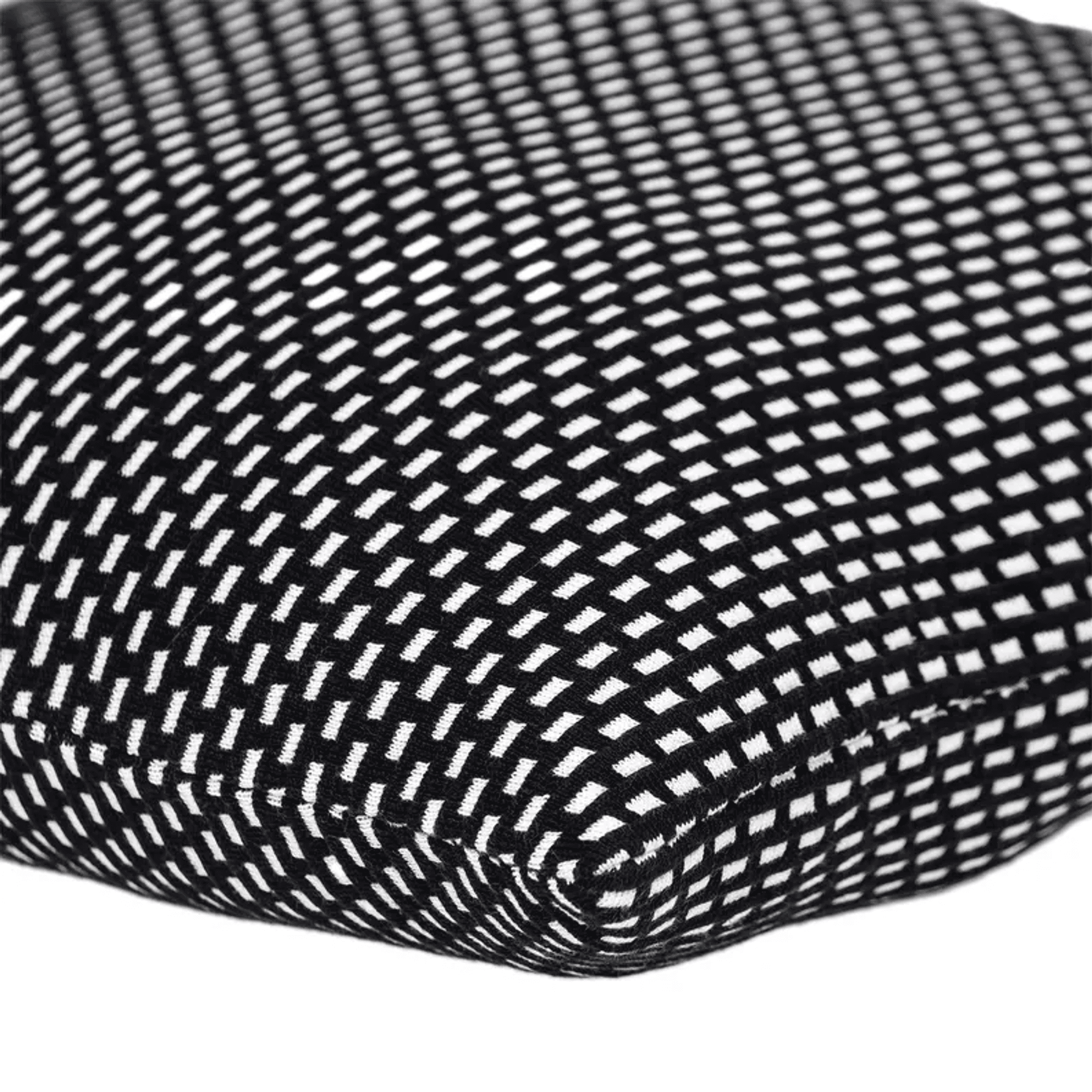 Close-up view of black and white woven grid fabric throw pillow