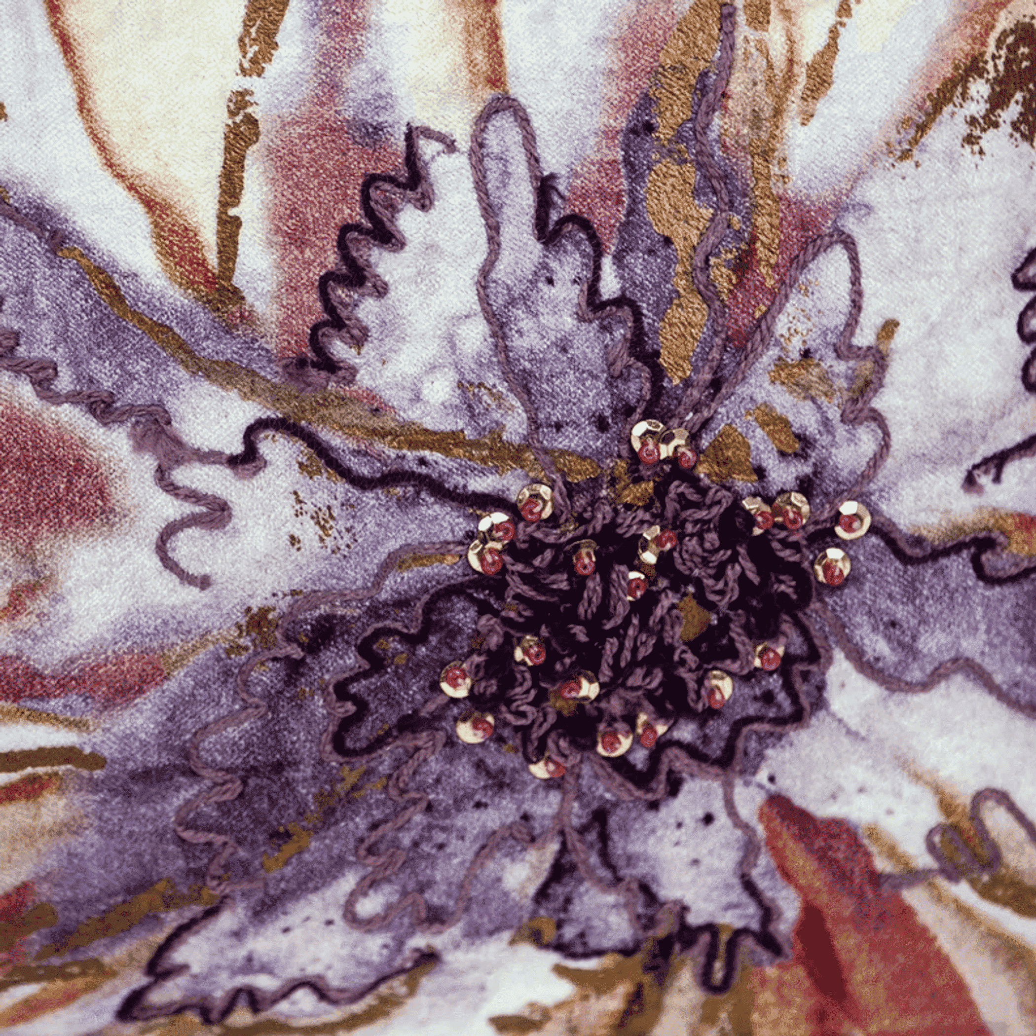 Multicolored floral pillow cover with purple beaded flower applique detail
