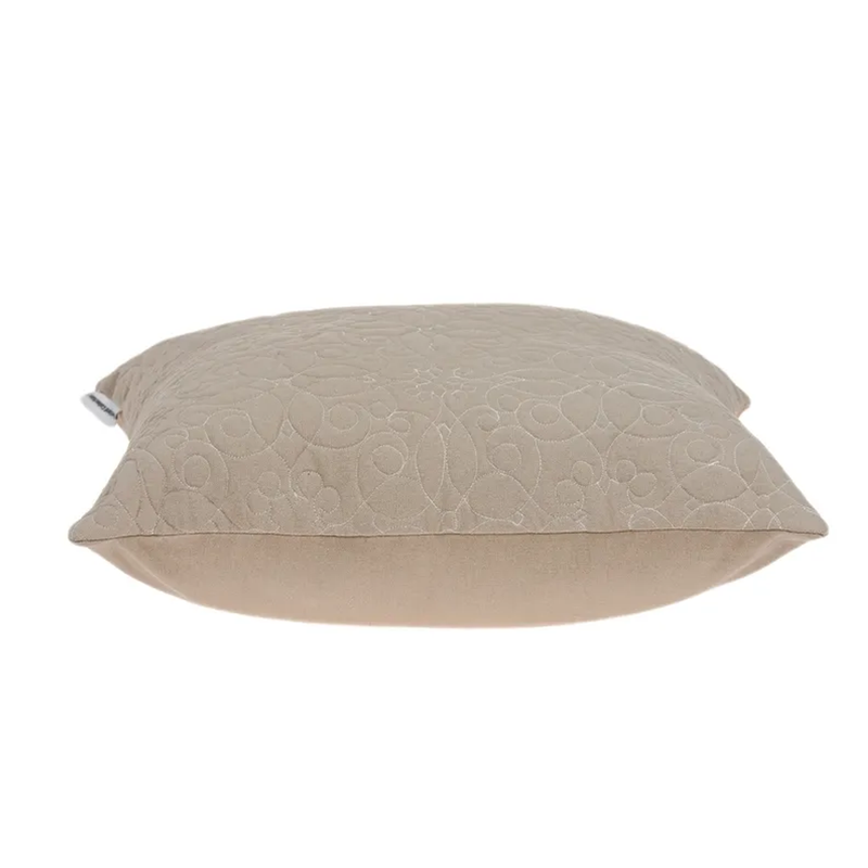 Beige throw pillow showing side profile with embossed quilted top panel