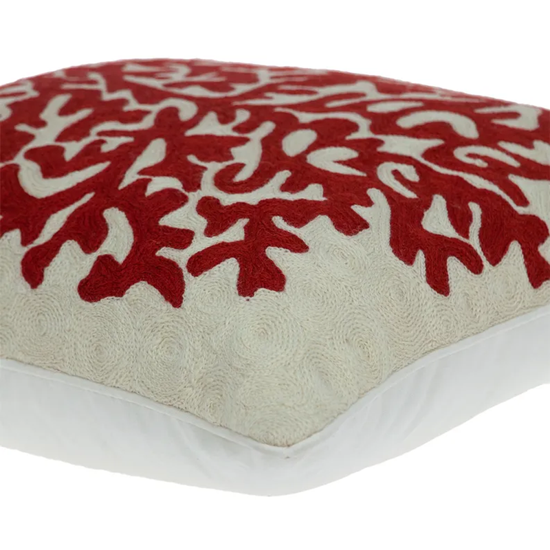 Beige pillow cover with red coral pattern, textured fabric