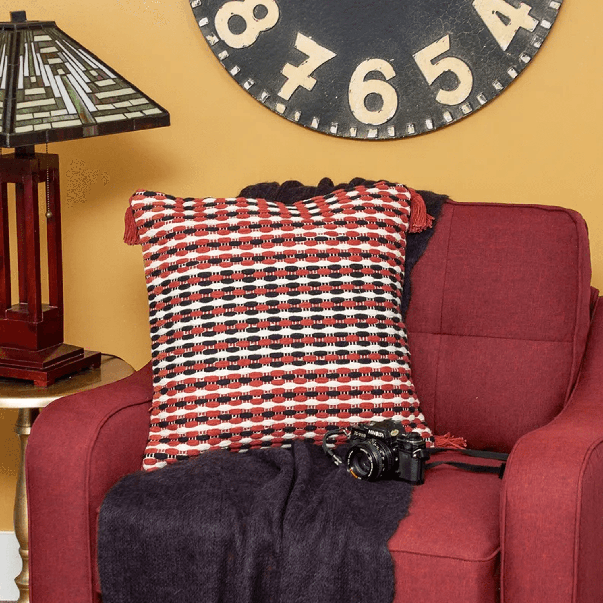 Multicolored patterned pillow cover with tassels, red black cream geometric front