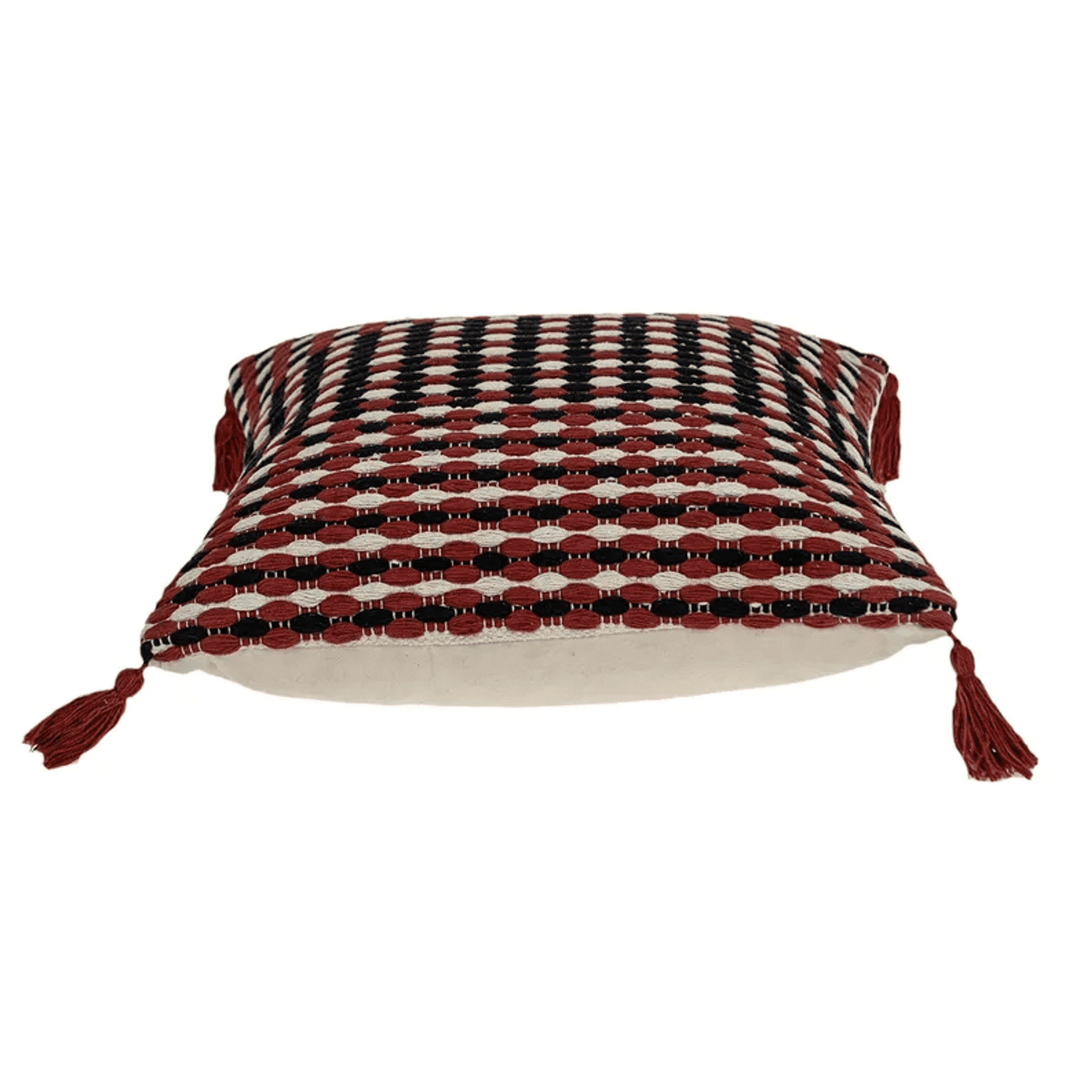 Multicolored patterned pillow cover with tassels on corners, angled view