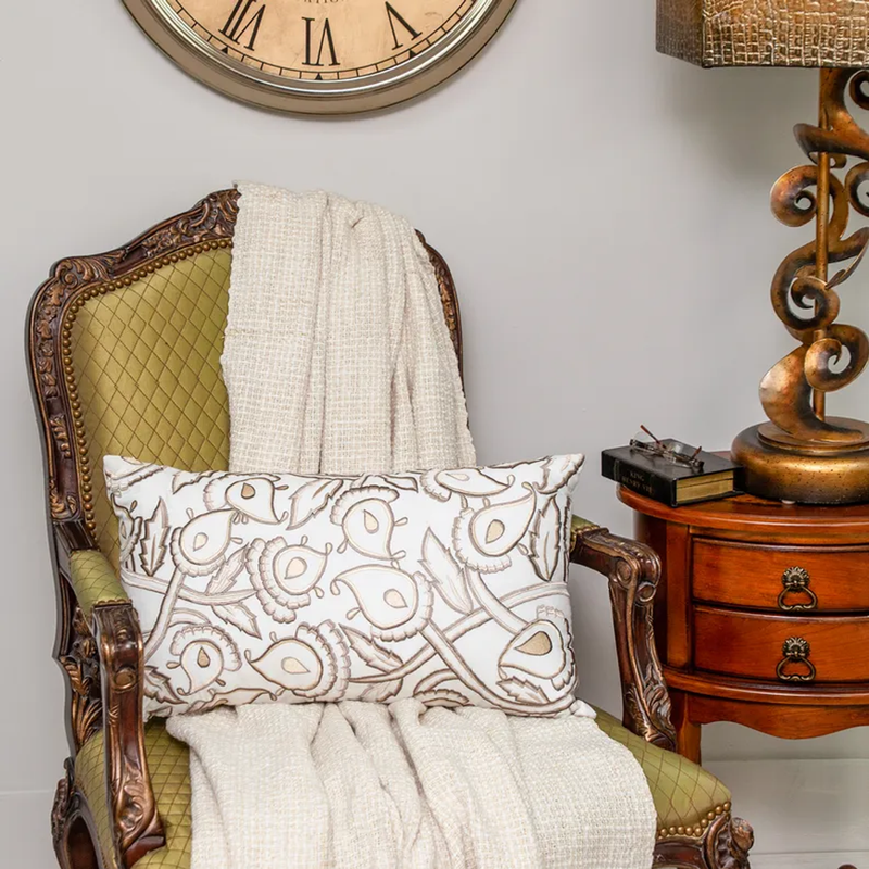 White accent pillow cover with tan and brown whimsical bird and leaf pattern
