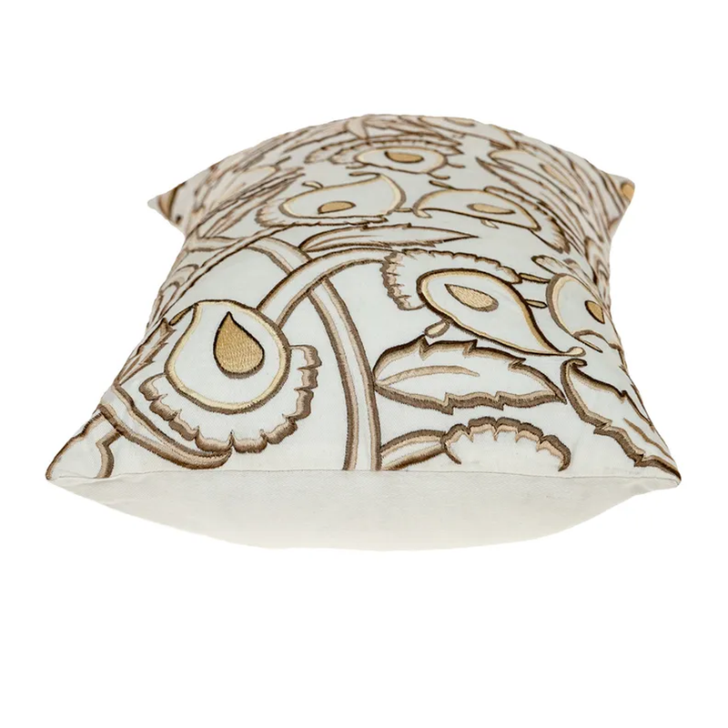 White lumbar pillow cover with tan and brown decorative scroll and bird design