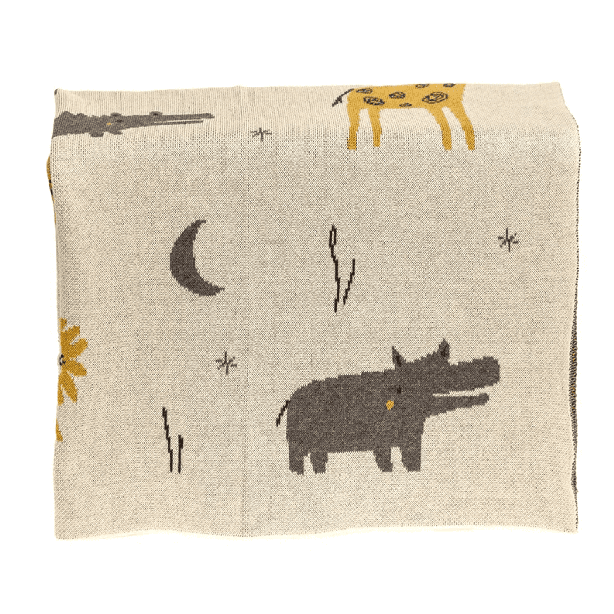 Beige baby blanket with moon, stars and dark animal silhouettes, partial close-up