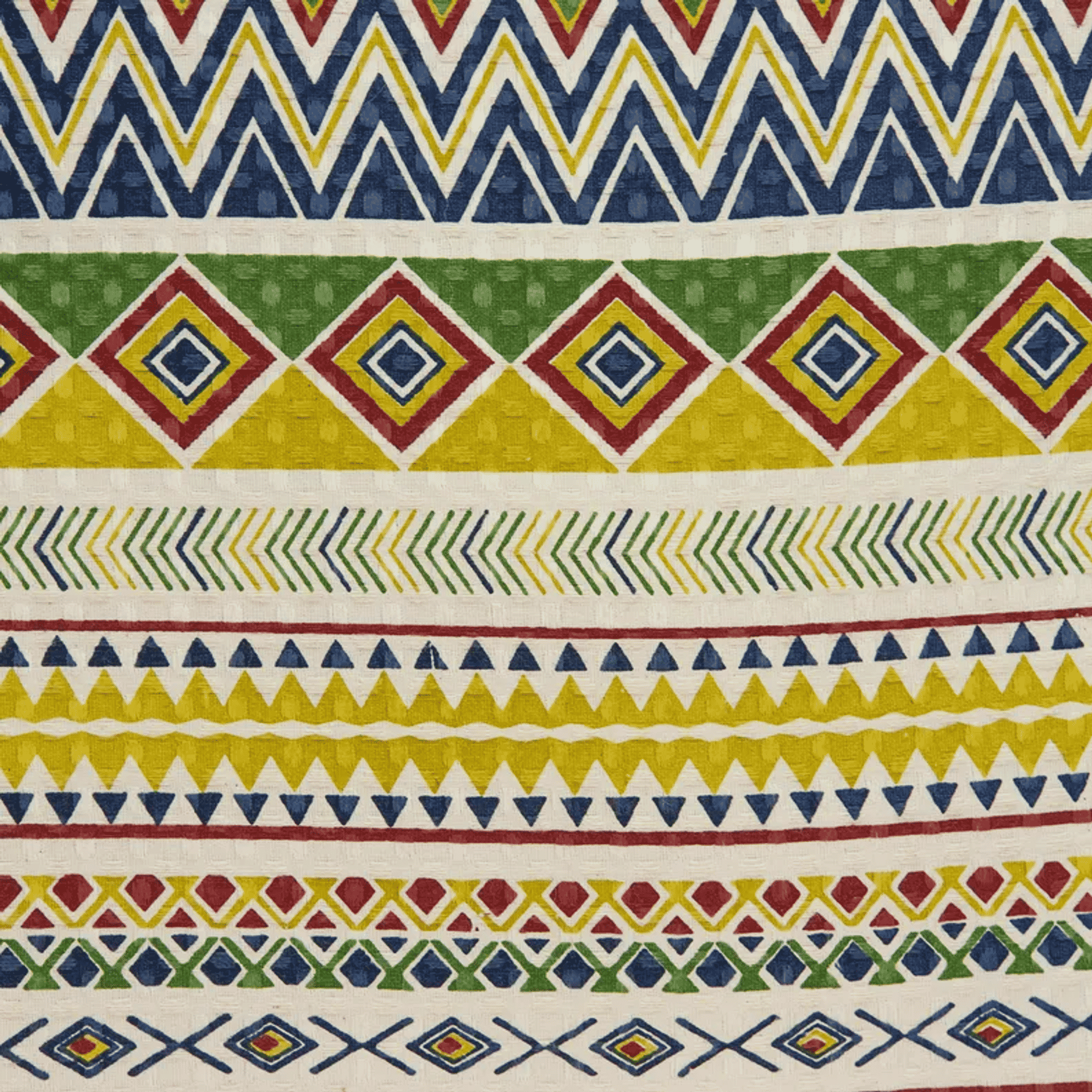 Close-up of multicolor geometric pattern on a decorative throw pillow