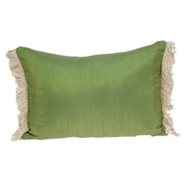 Green accent pillow cover with plain fabric front and cream fringe border