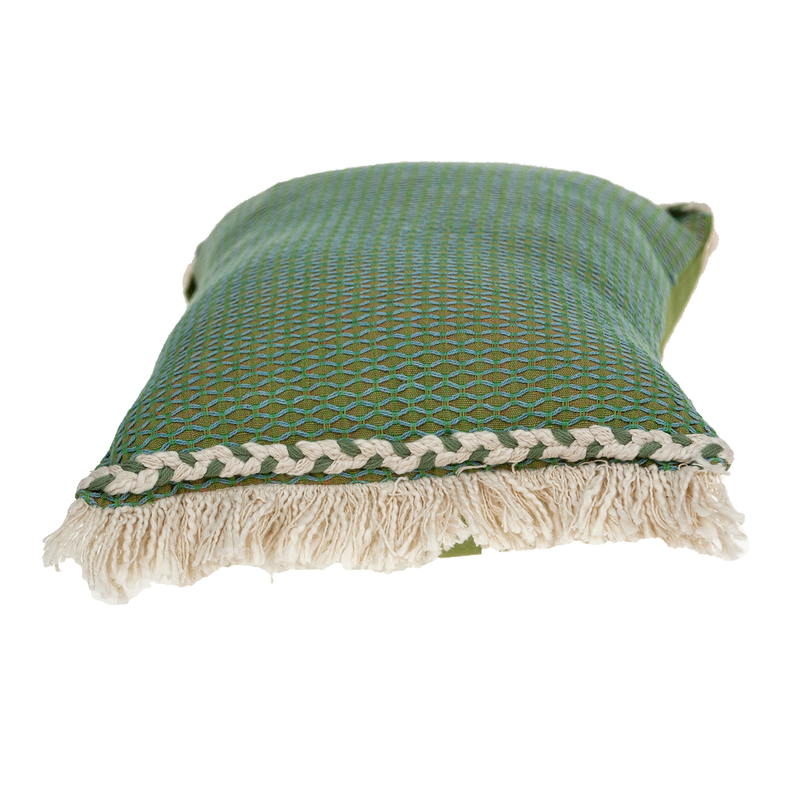 Green woven pillow cover with lattice pattern and cream fringe tassel trim