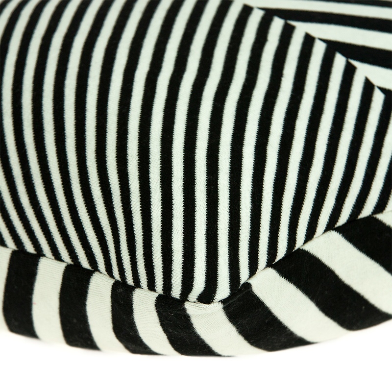 Black and white striped throw pillow fabric close-up with textured weave