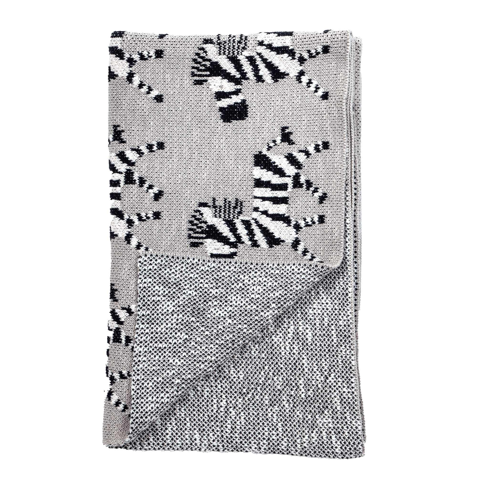 Gray knitted baby blanket corner with zebra print knit texture
