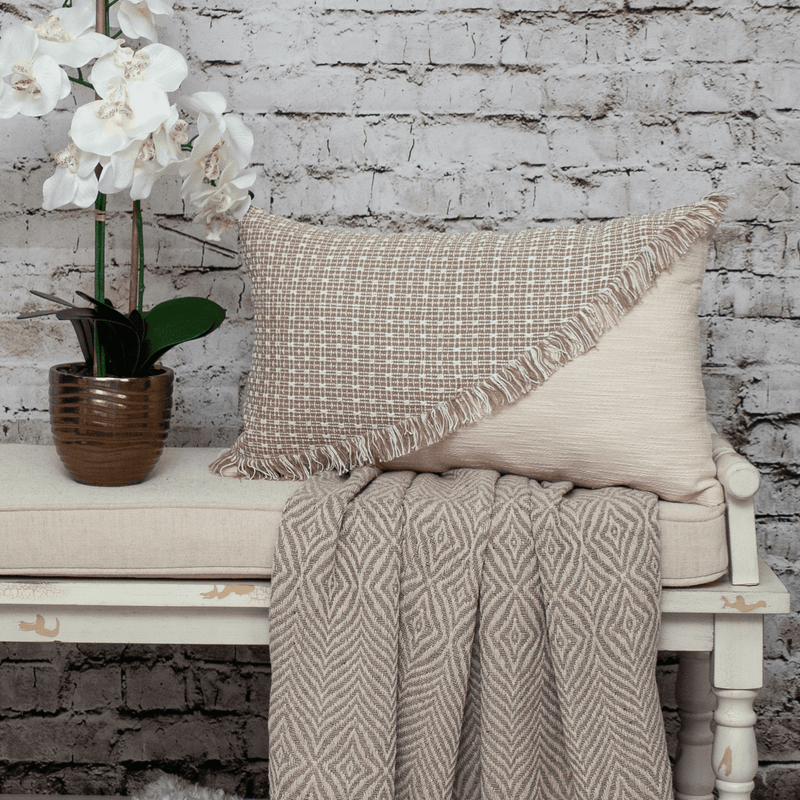 Dark-brown grid woven throw pillow with fringe trim and beige backing