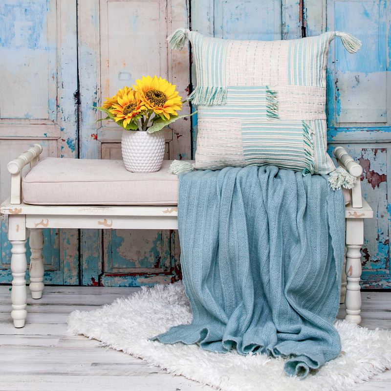 Cream and mint striped throw pillow with corner tassels