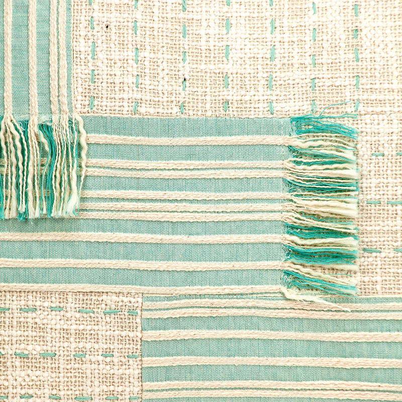 Mint and cream striped pillow fabric with layered fringe tassels