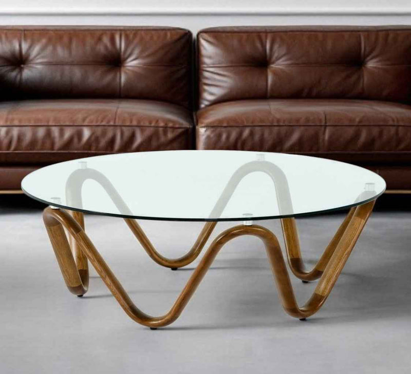 45" Clear and Brown Glass And Solid Wood Round Abstract Coffee Table