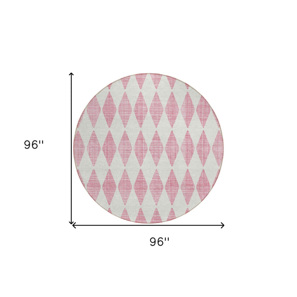 8' Pink And Ivory Round Geometric Washable Indoor Outdoor Area Rug