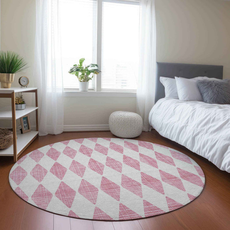 8' Pink And Ivory Round Geometric Washable Indoor Outdoor Area Rug