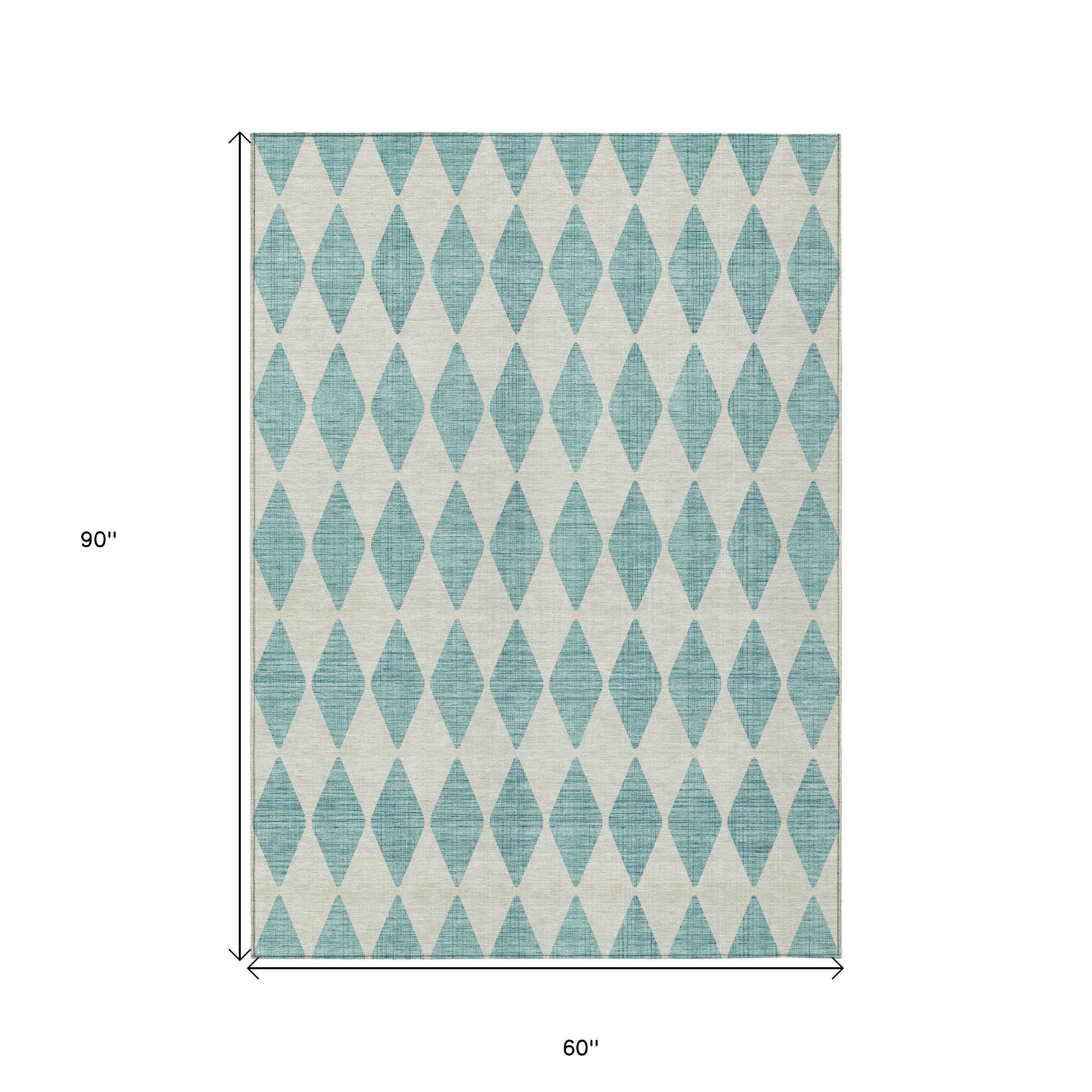 5' X 8' Teal Blue And Ivory Geometric Washable Indoor Outdoor Area Rug