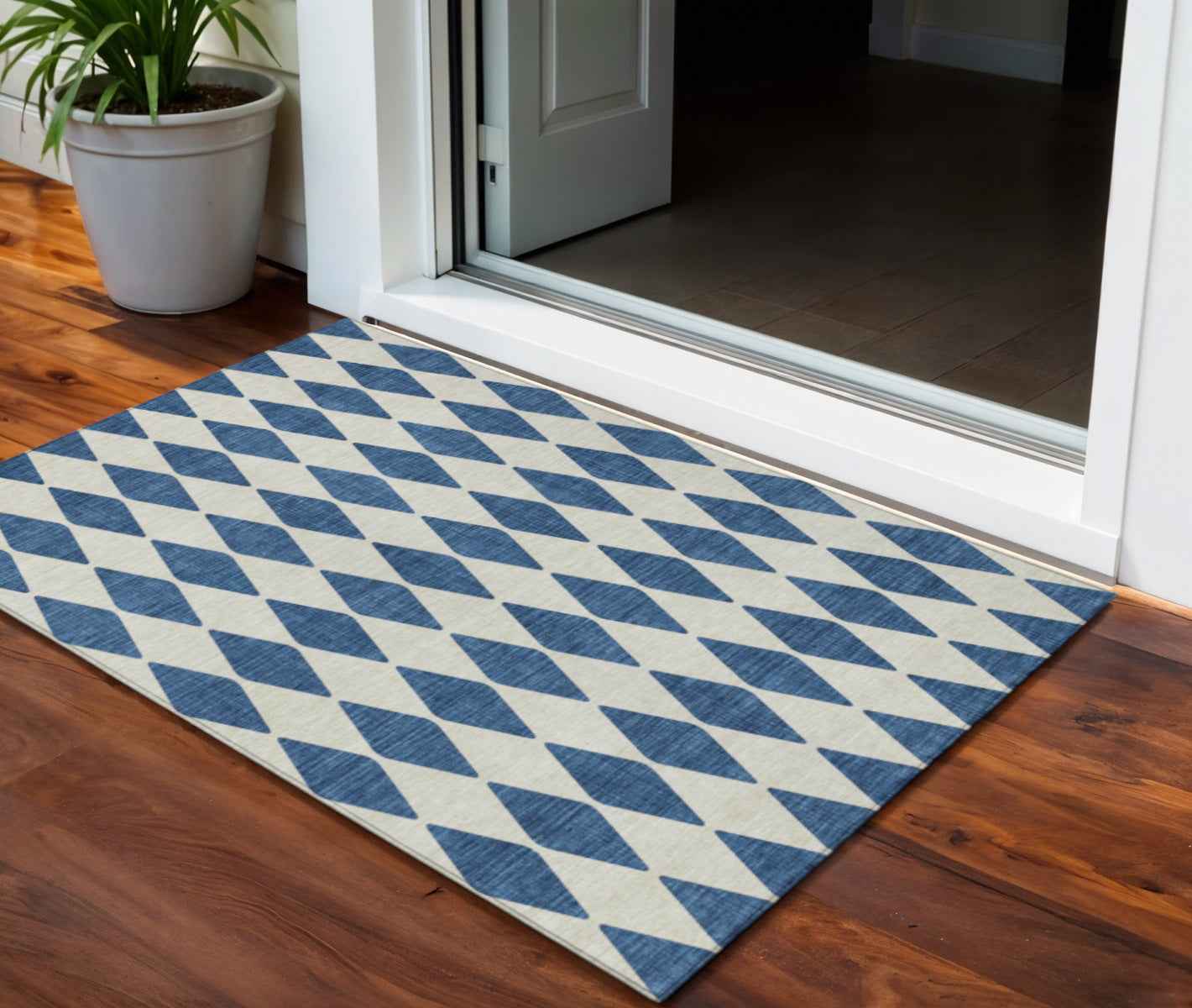 3' X 5' Navy Blue And Ivory Geometric Washable Indoor Outdoor Area Rug